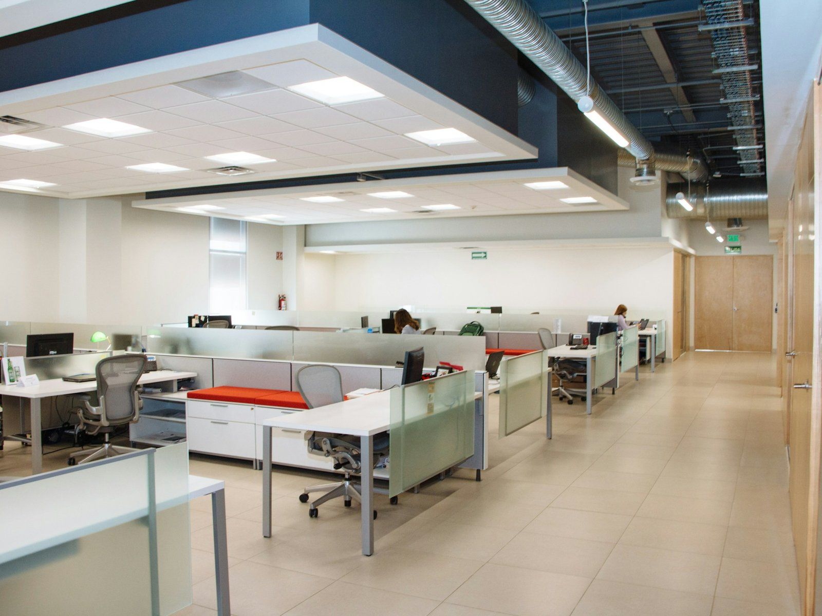 Bright office with white desks